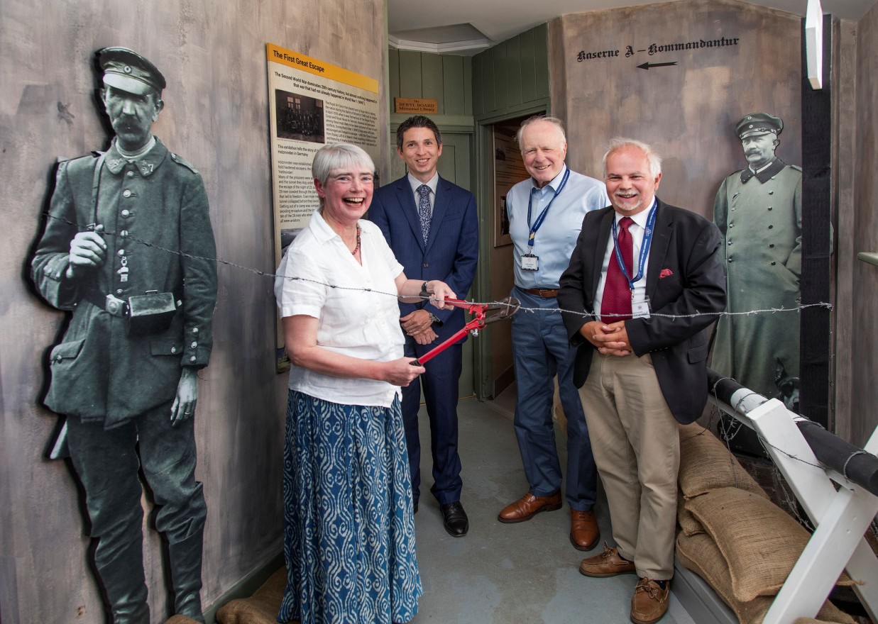 LtR Sarah Paterson opening the exibition with Dr Henry Raffal, John Aldridge and Stephen Nunn