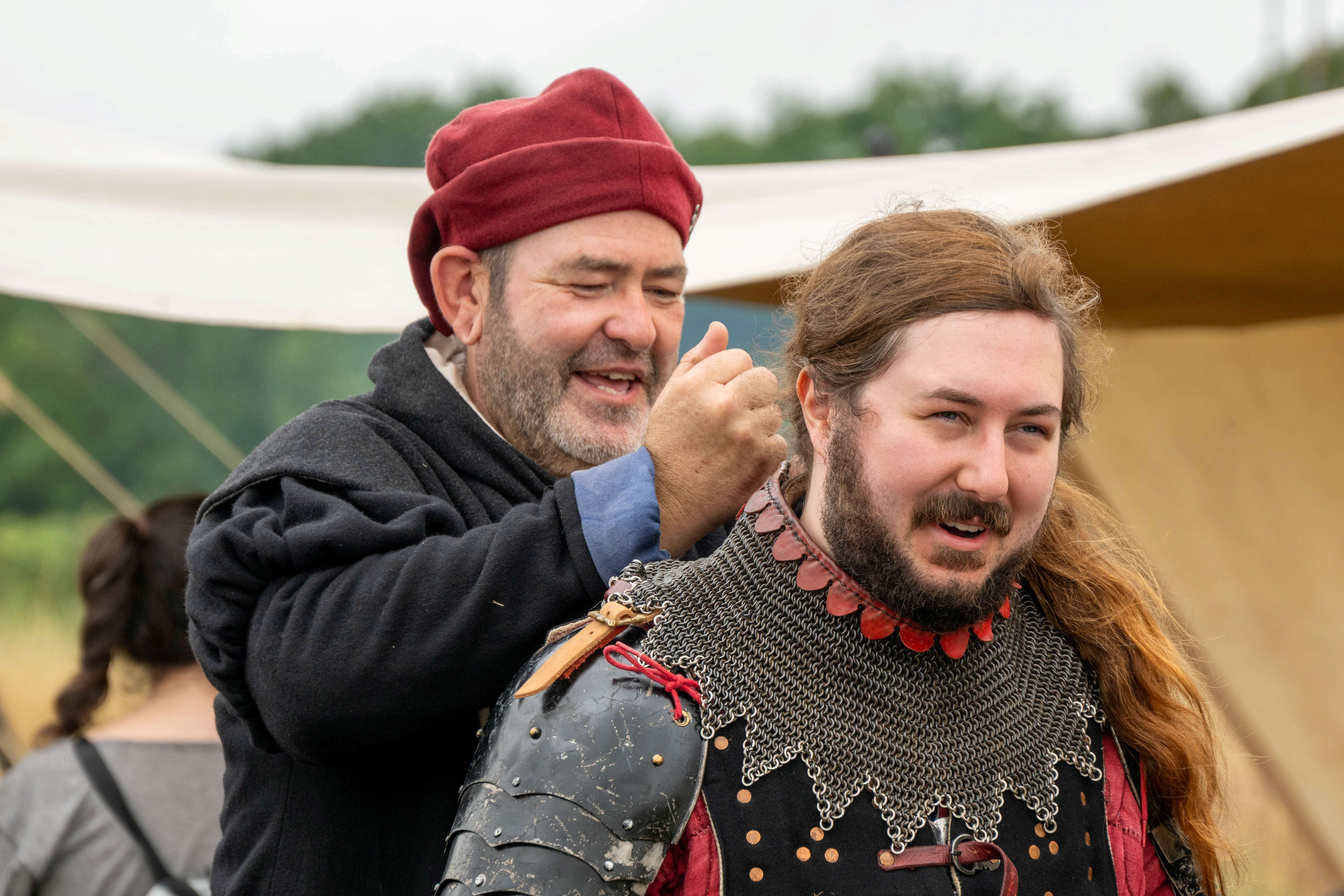 Visitor Jude Pretoria volunteers to be dressed as a medieval fighting man Photo: Martin Johnson
