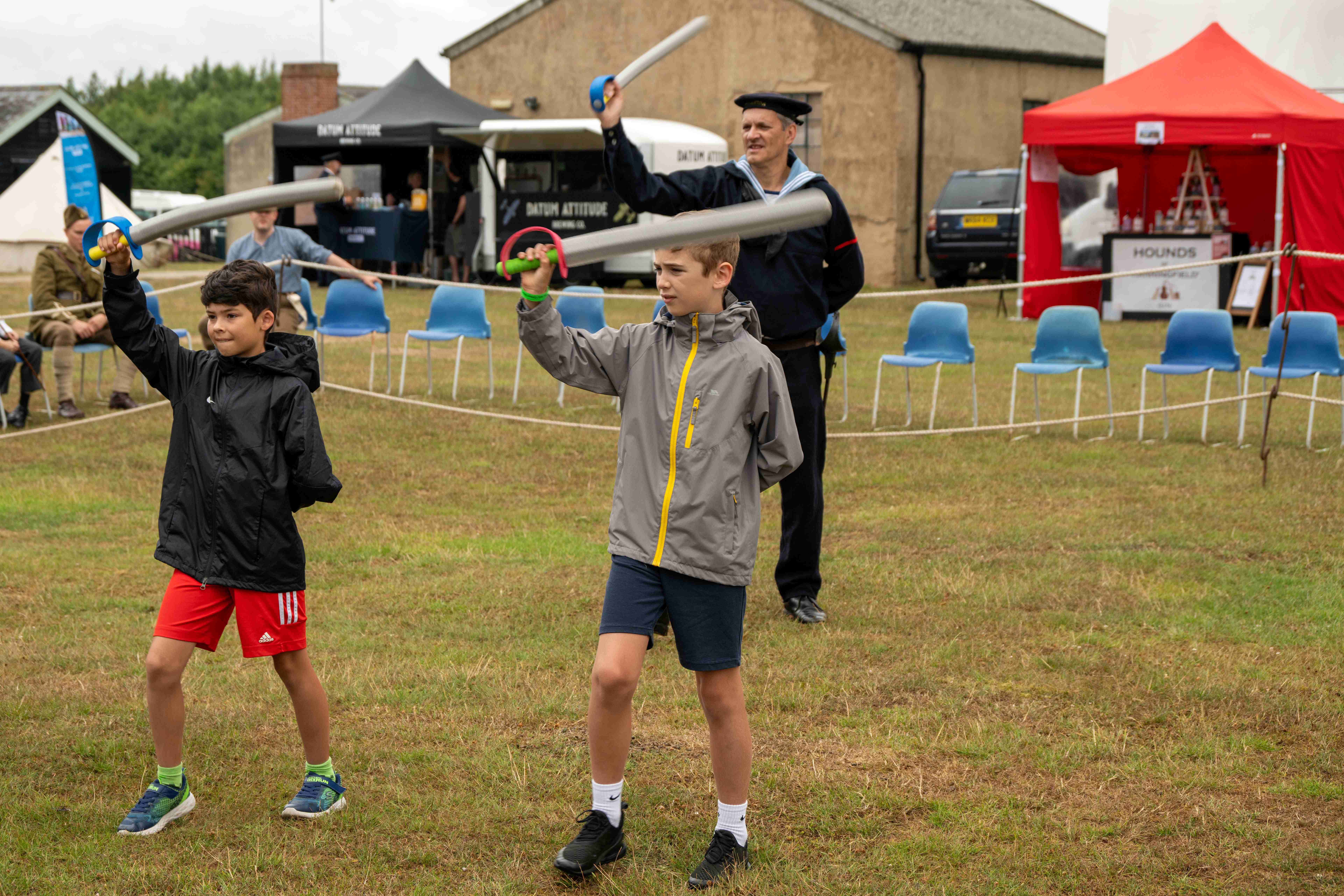 Young visitors Tom Hardy and Henry Jones at Cutlass Drill with The BlueJackets Photo: Martin Johnson