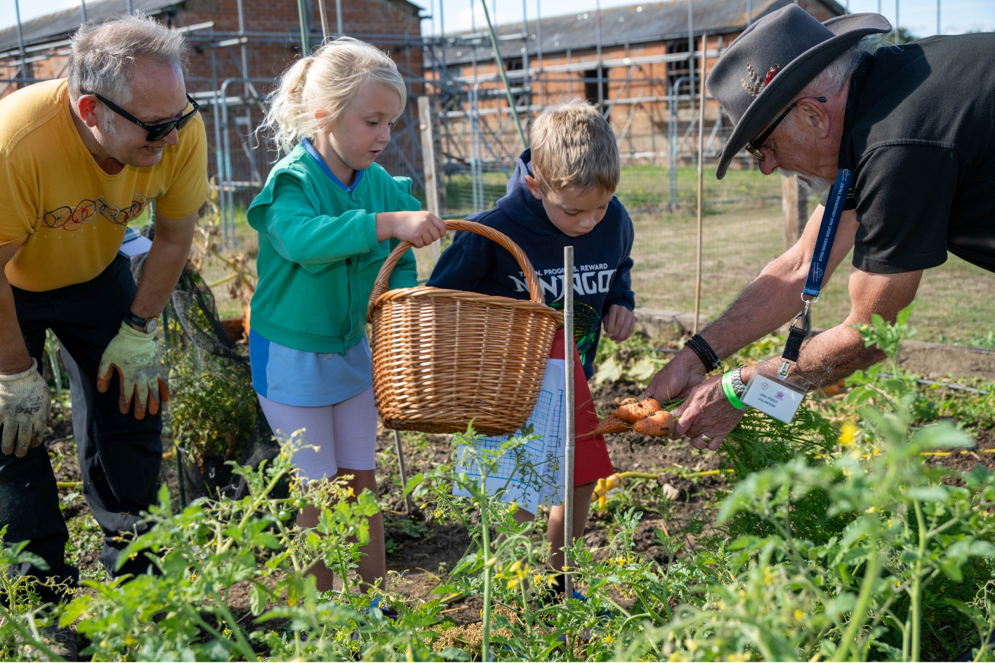William and Lottie visit the allotment at Back to the WW2 Farm credit Martin Johnson